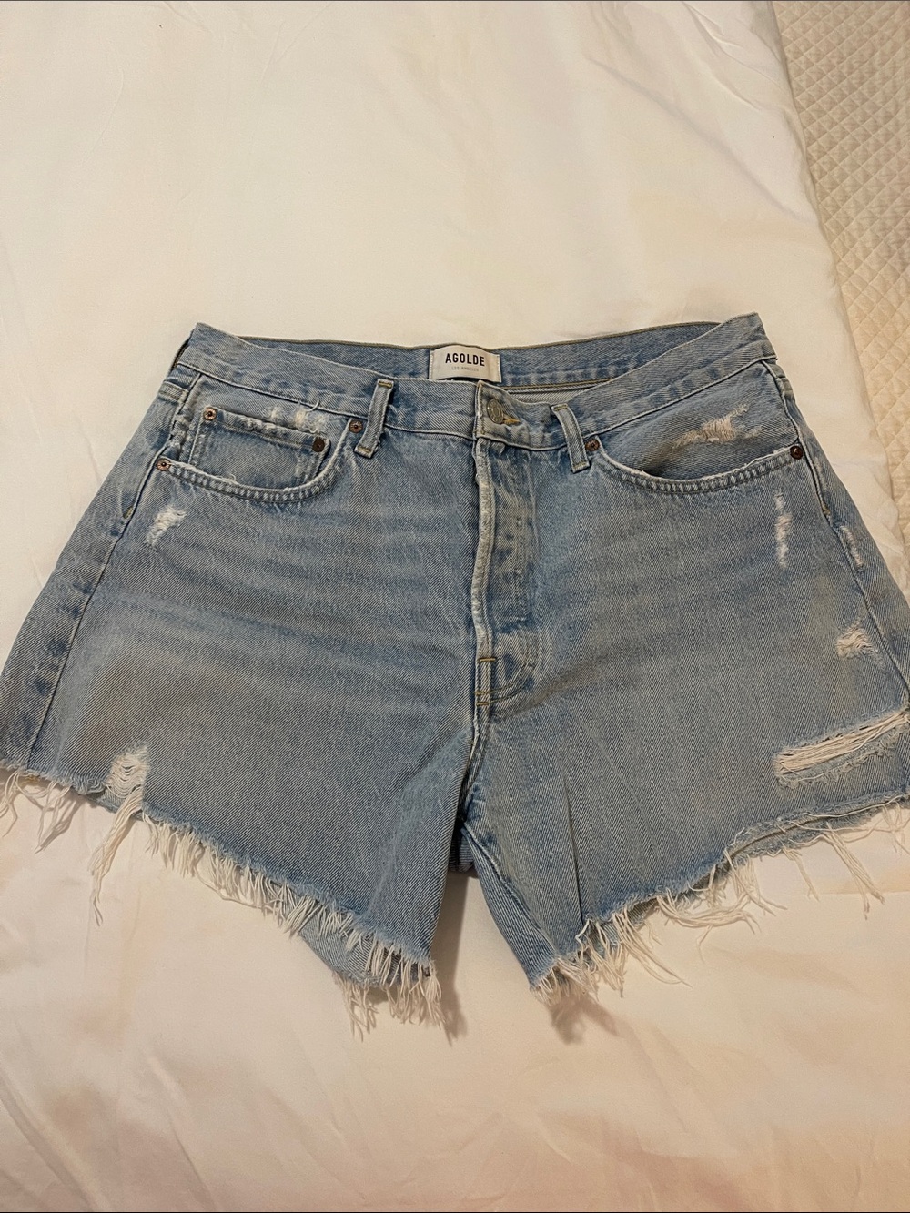 Agolde Light Wash Distressed Denim Cutoff Shorts